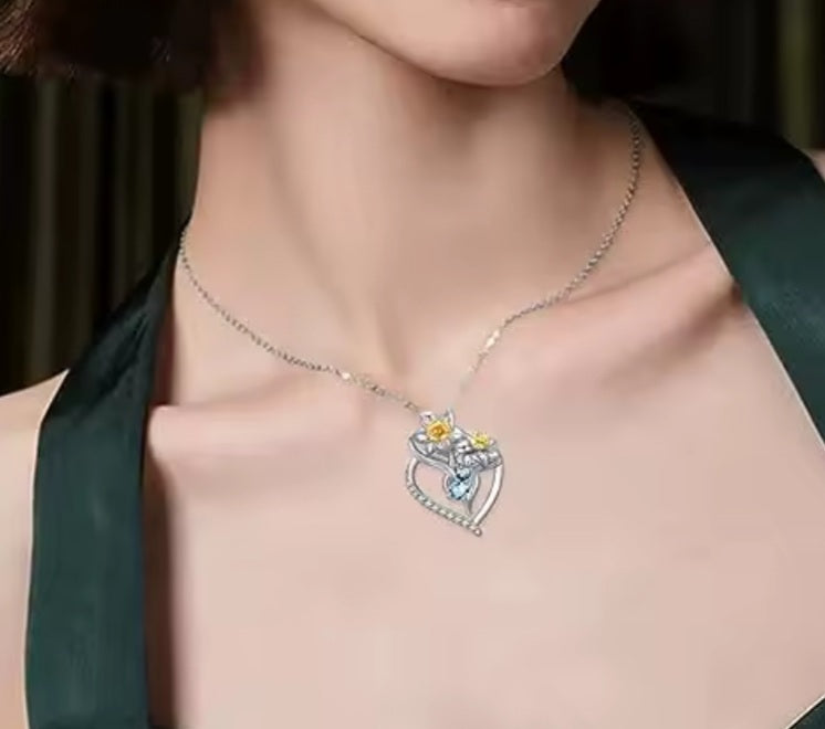 Collier coeur Narcisse jaune strass bleu