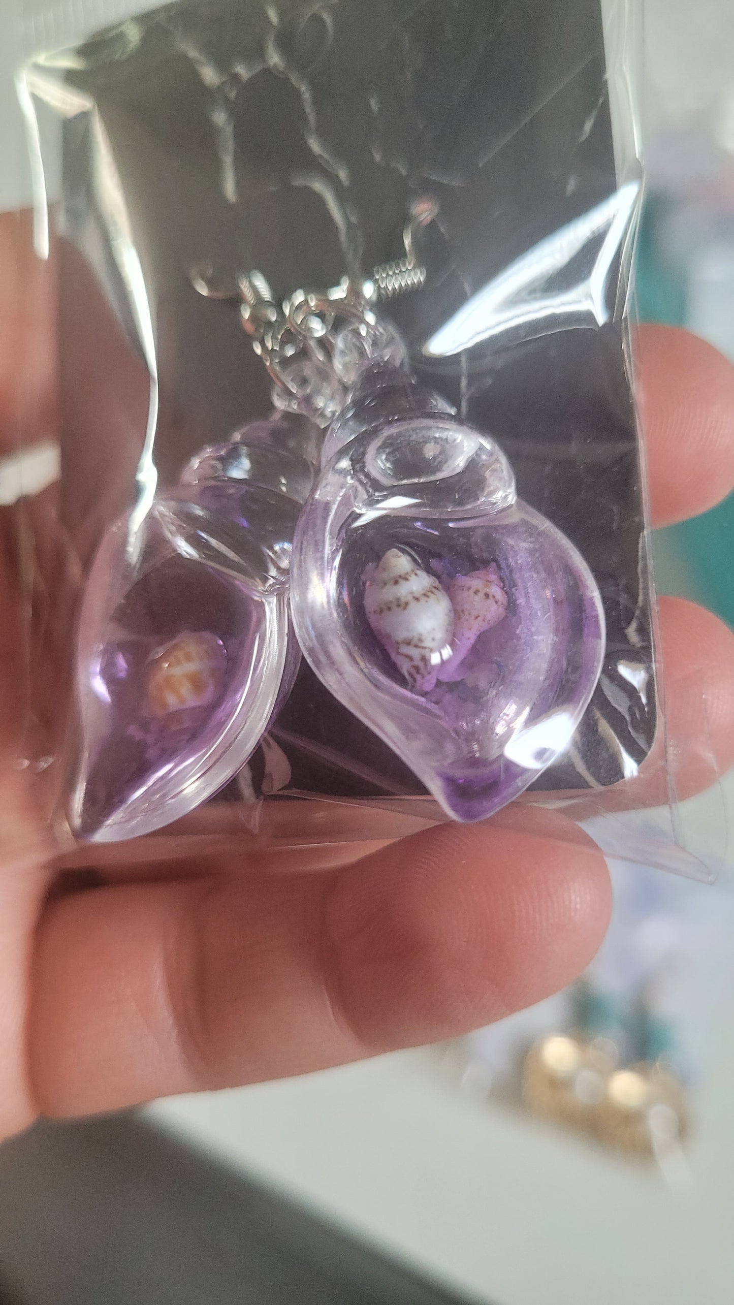 boucles coquillage violet