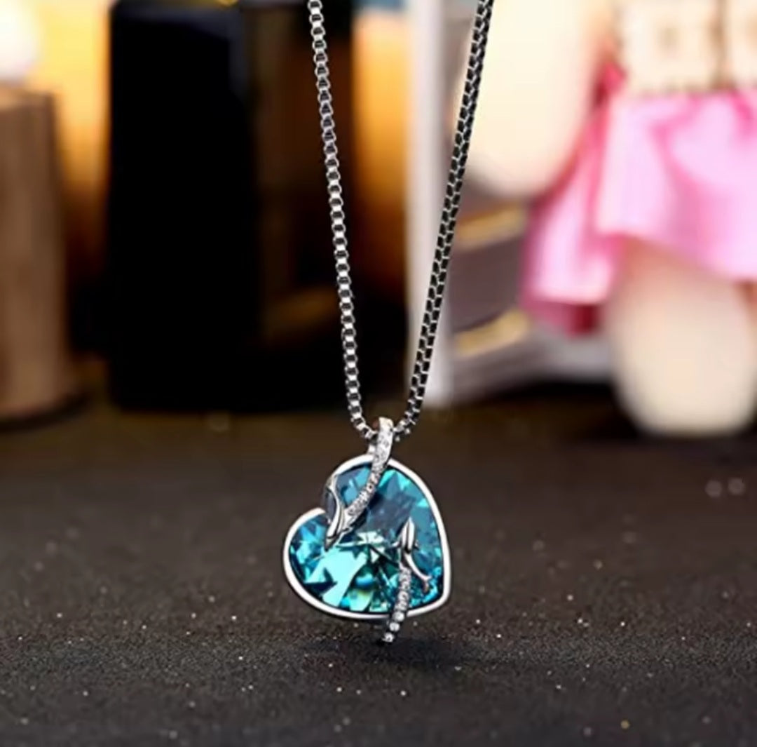 Collier coeur Océane bleu dauphins