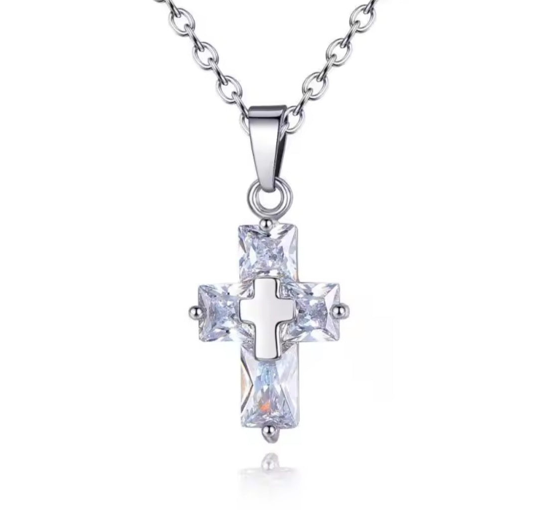 Collier croix transparente doré
